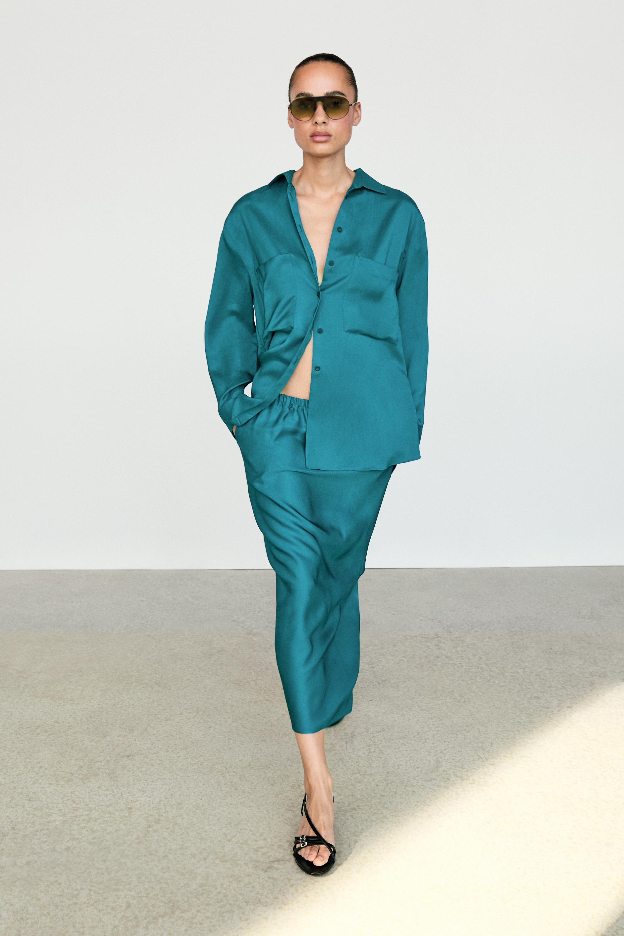 Chemise fluide satinée à poches